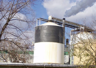 applying carbon fiber wrap to tank